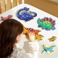 pierwsze puzzle dinozaury2.webp